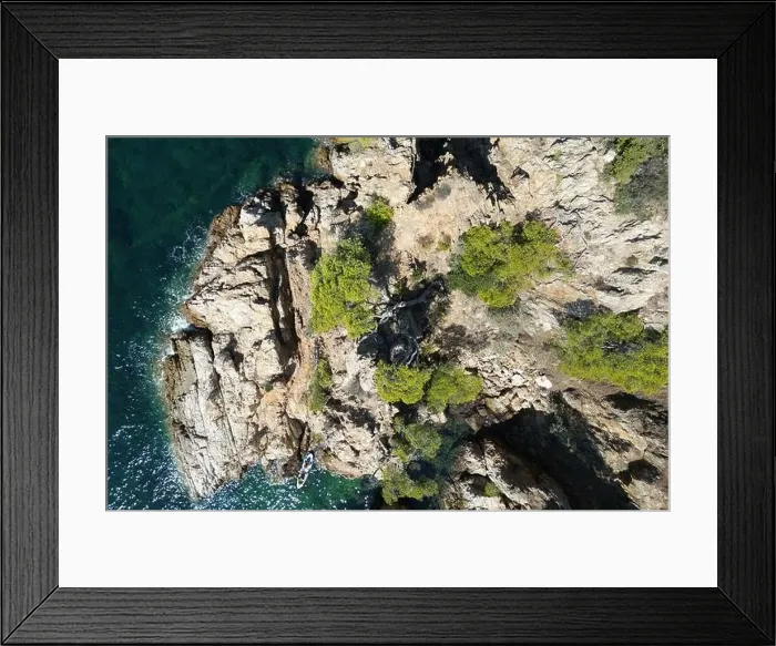 Framed Print : Aerial drone photo looking down on a rocky outcrop in the French Mediterranean of the Var department, France Framed Print : Aerial drone photo looking down on a rocky outcrop in the French Mediterranean of the Var department, France