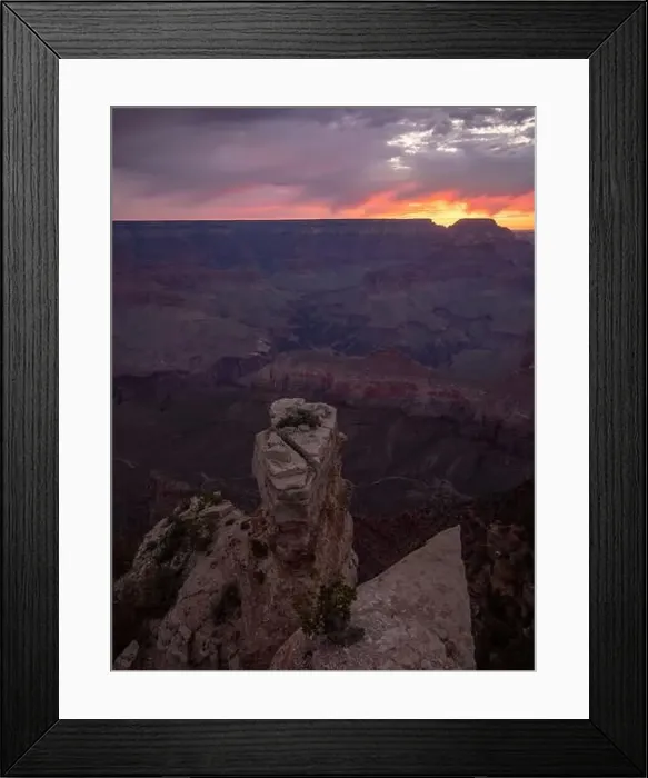 Framed Print : Picturesque aerial view of rough rocky formations against cloudy sundown sky in evening in USA Framed Print : Picturesque aerial view of rough rocky formations against cloudy sundown sky in evening in USA