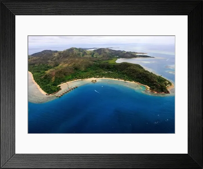 Framed Print : aerial view of a fiji resort on the ocean with island in the background Framed Print : aerial view of a fiji resort on the ocean with island in the background