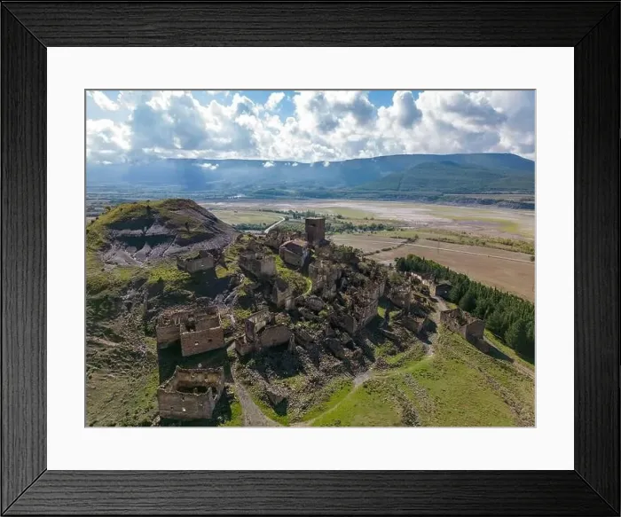Framed Print : Aerial drone photo of the abandoned ghost town named Esco. Esco is located next to lake Aragon in Northern Spain Framed Print : Aerial drone photo of the abandoned ghost town named Esco. Esco is located next to lake Aragon in Northern Spain