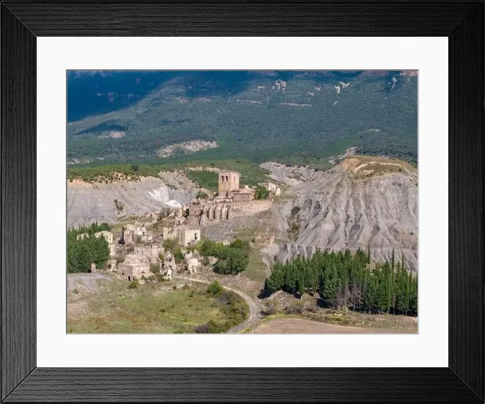 Framed Print : Aerial drone photo of the abandoned ghost town named Esco. Esco is located next to lake Aragon in Northern Spain Framed Print : Aerial drone photo of the abandoned ghost town named Esco. Esco is located next to lake Aragon in Northern Spain