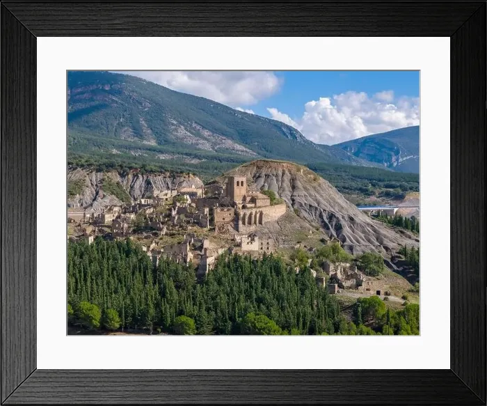 Framed Print : Aerial drone photo of the abandoned ghost town named Esco. Esco is located next to lake Aragon in Northern Spain Framed Print : Aerial drone photo of the abandoned ghost town named Esco. Esco is located next to lake Aragon in Northern Spain