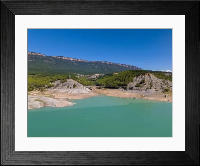 Framed Print : This aerial drone photo shows the beautiful lake Aragon in the Spanish Pyrenees Framed Print : This aerial drone photo shows the beautiful lake Aragon in the Spanish Pyrenees