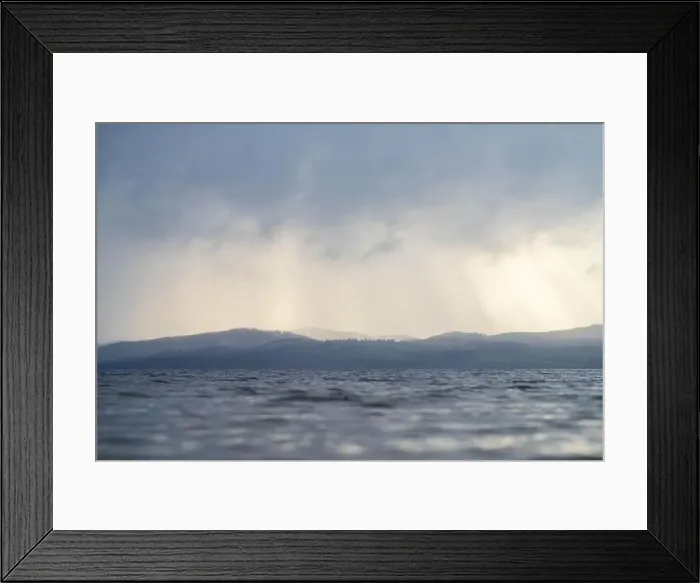 Framed Print : rays through clouds over the water Framed Print : rays through clouds over the water