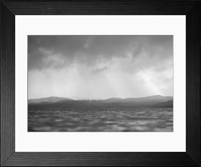 Framed Print : rays through clouds over the water Framed Print : rays through clouds over the water