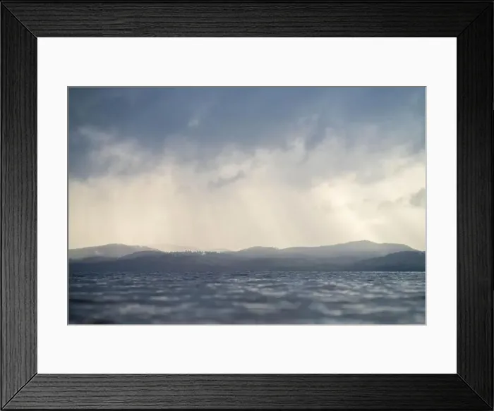 Framed Print : rays through clouds over the water Framed Print : rays through clouds over the water