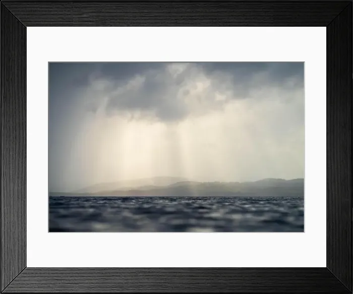 Framed Print : rays through clouds over the water Framed Print : rays through clouds over the water
