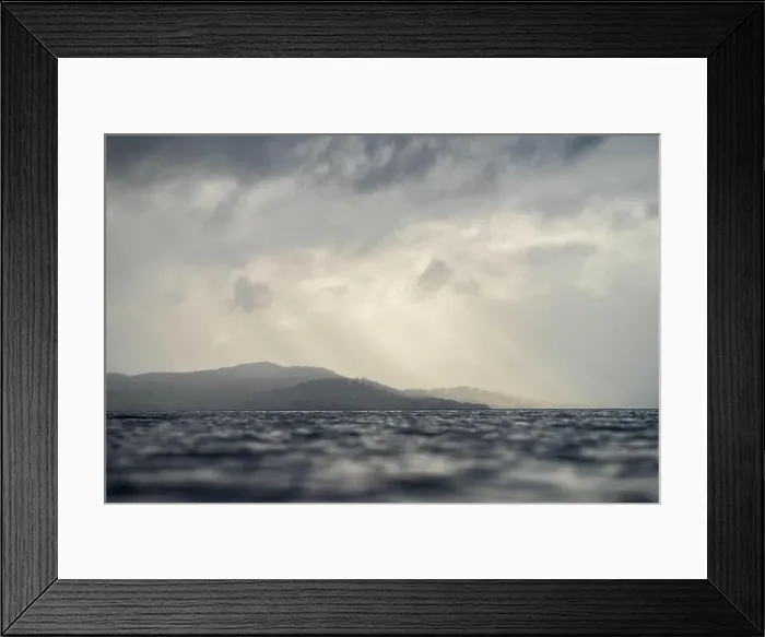 Framed Print : rays through clouds over the water Framed Print : rays through clouds over the water