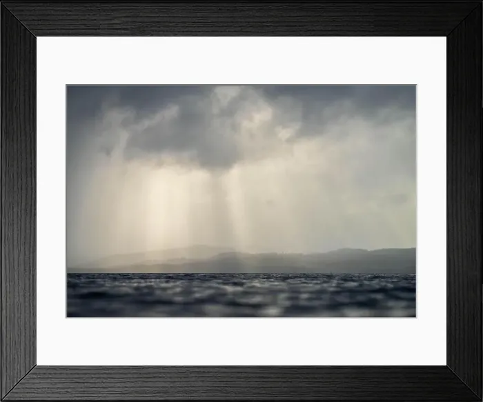 Framed Print : rays through clouds over the water Framed Print : rays through clouds over the water