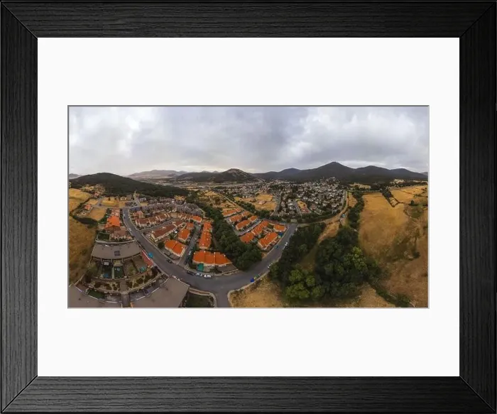 Framed Print : Breathtaking drone view of houses with red roof on Segovia city located in valley near mountains Framed Print : Breathtaking drone view of houses with red roof on Segovia city located in valley near mountains