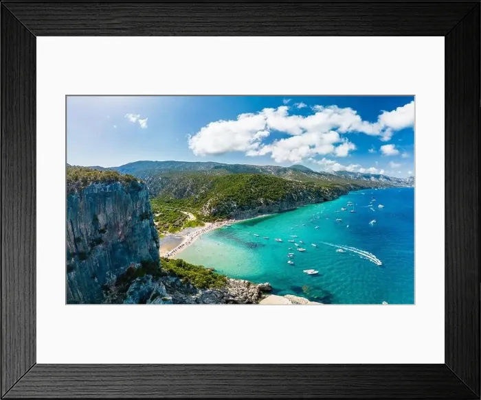 Framed Print : Aerial drone view of the vibrant Cala Luna Beach on Sardinia island, Italy Framed Print : Aerial drone view of the vibrant Cala Luna Beach on Sardinia island, Italy
