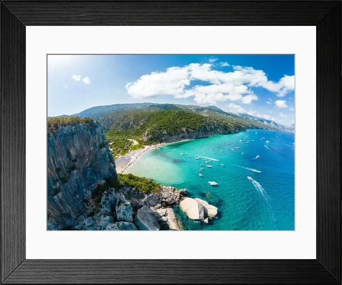Framed Print : Aerial drone view of the vibrant Cala Luna Beach on Sardinia island, Italy Framed Print : Aerial drone view of the vibrant Cala Luna Beach on Sardinia island, Italy