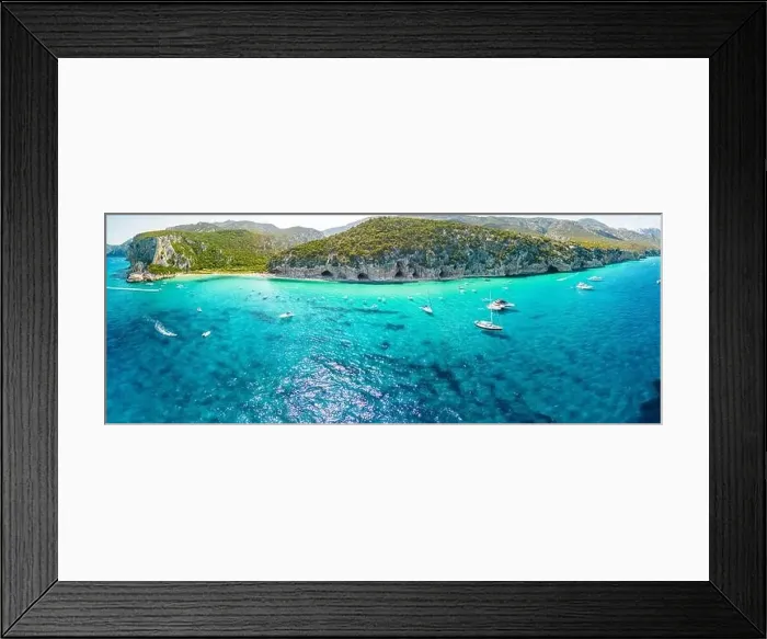 Framed Print : Aerial drone view of the vibrant Cala Luna Beach on Sardinia island, Italy Framed Print : Aerial drone view of the vibrant Cala Luna Beach on Sardinia island, Italy