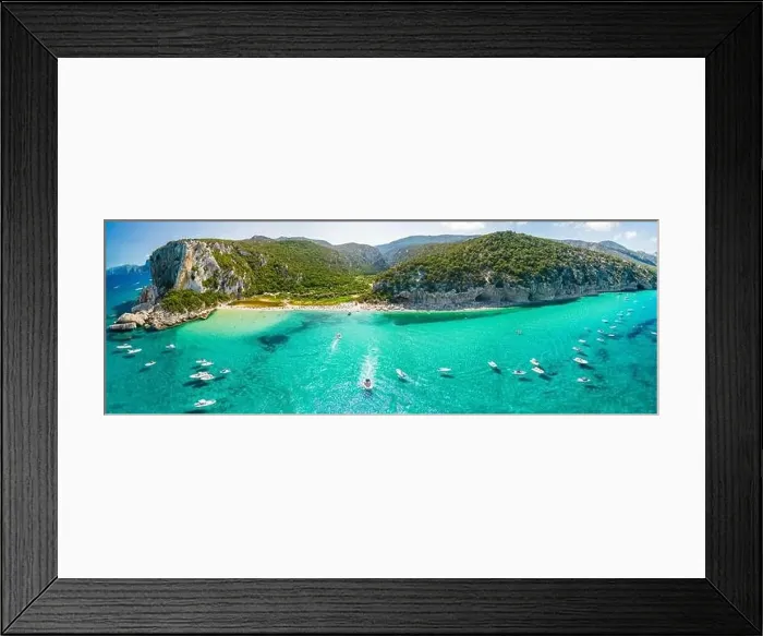 Framed Print : Aerial drone view of the vibrant Cala Luna Beach on Sardinia island, Italy Framed Print : Aerial drone view of the vibrant Cala Luna Beach on Sardinia island, Italy