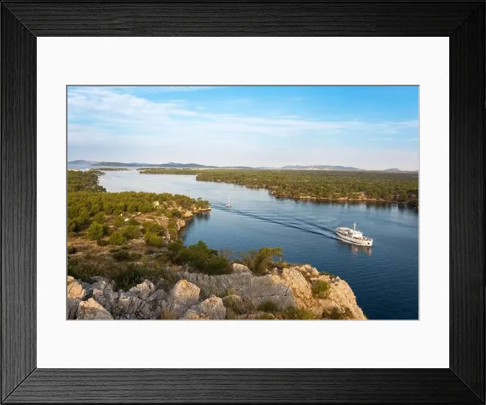 Framed Print : View of a boat navigating at Sveti ante canal, SÌŒibenik, Croatia Framed Print : View of a boat navigating at Sveti ante canal, SÌŒibenik, Croatia