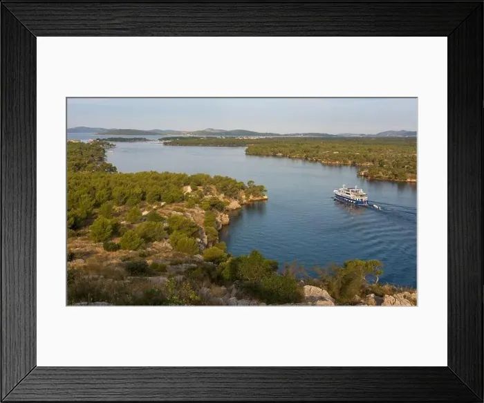 Framed Print : View of a boat navigating at Sveti ante canal, SÌŒibenik, Croatia Framed Print : View of a boat navigating at Sveti ante canal, SÌŒibenik, Croatia