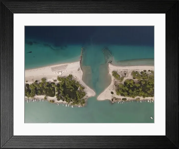 Framed Print : Overhead drone photo over the tropical blue ocean and the bay of Glarokavos in Paliouri, Halkidiki, Greece Framed Print : Overhead drone photo over the tropical blue ocean and the bay of Glarokavos in Paliouri, Halkidiki, Greece