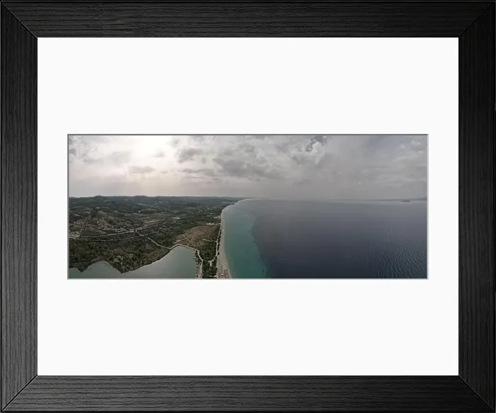 Framed Print : Overhead drone photo over the tropical blue ocean and the bay of Glarokavos in Paliouri, Halkidiki, Greece Framed Print : Overhead drone photo over the tropical blue ocean and the bay of Glarokavos in Paliouri, Halkidiki, Greece