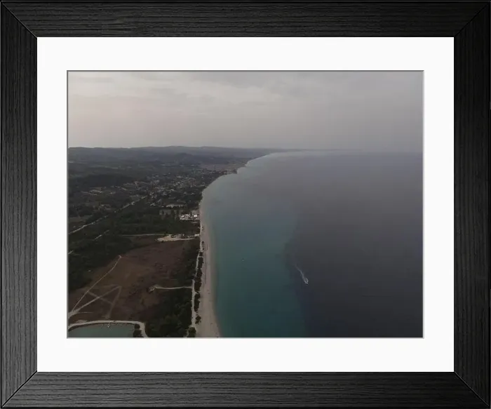 Framed Print : Overhead drone photo over the tropical blue ocean and the bay of Glarokavos in Paliouri, Halkidiki, Greece Framed Print : Overhead drone photo over the tropical blue ocean and the bay of Glarokavos in Paliouri, Halkidiki, Greece