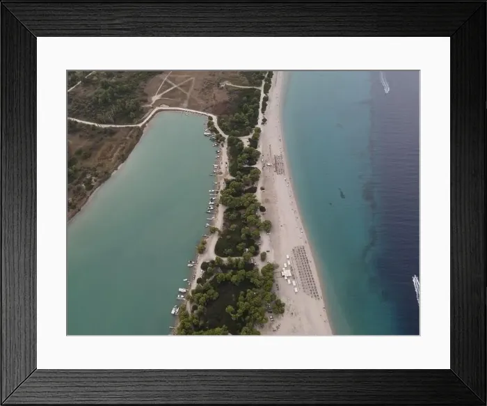 Framed Print : Overhead drone photo over the tropical blue ocean and the bay of Glarokavos in Paliouri, Halkidiki, Greece Framed Print : Overhead drone photo over the tropical blue ocean and the bay of Glarokavos in Paliouri, Halkidiki, Greece