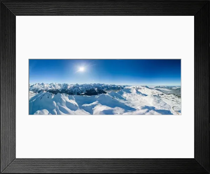 Framed Print : Aerial drone view of snow covered mountains and ski slopes, ski area Stoos, Switzerland Framed Print : Aerial drone view of snow covered mountains and ski slopes, ski area Stoos, Switzerland