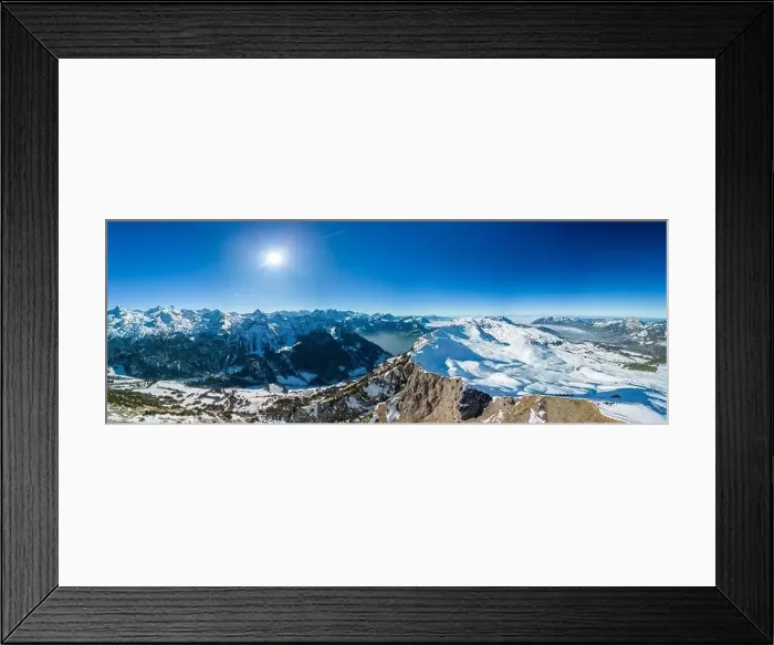 Framed Print : Aerial drone view of snow covered mountains and ski slopes, ski area Stoos, Switzerland Framed Print : Aerial drone view of snow covered mountains and ski slopes, ski area Stoos, Switzerland
