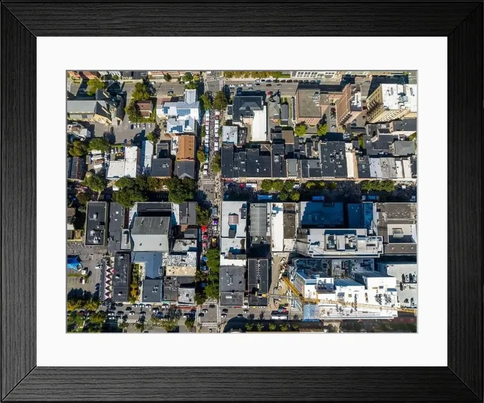 Framed Print : Ithaca, NY, USA - September 30 2023: Aerial image of the Ithaca Commons during the annual Apple Festival