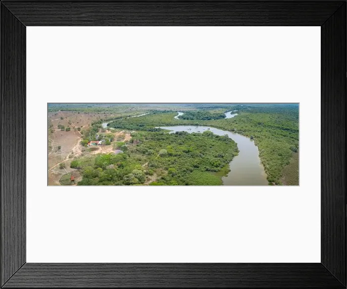 Framed Print : Areal view of typical Pantanal landscape, meandering tropical river through rainforest and deforeste Framed Print : Areal view of typical Pantanal landscape, meandering tropical river through rainforest and deforeste