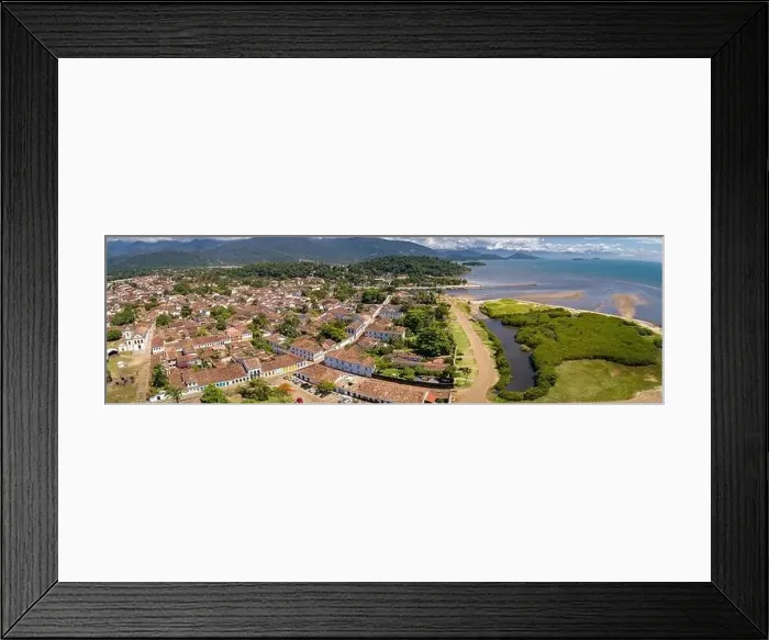 Framed Print : Panoramic aerial view to historic town Paraty with green mountains and sea in background on a sunny Framed Print : Panoramic aerial view to historic town Paraty with green mountains and sea in background on a sunny