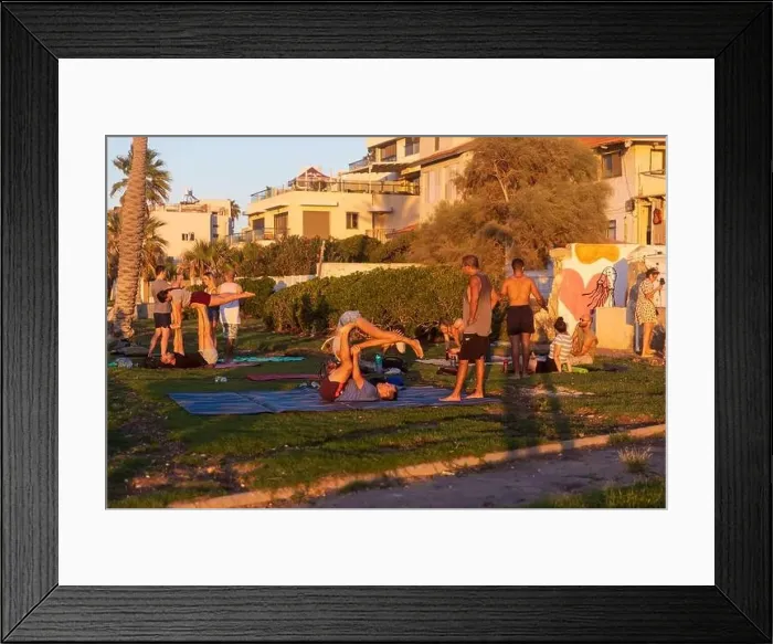 Framed Print : Haifa, Israel - March 1, 2023, Promenade along the sea. Women and men do yoga and sports near the beach in Haifa Framed Print : Haifa, Israel - March 1, 2023, Promenade along the sea. Women and men do yoga and sports near the beach in Haifa