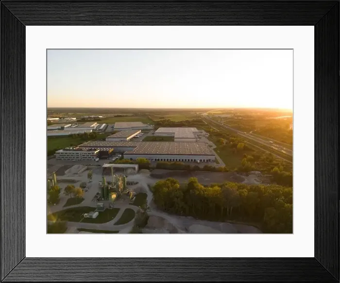 Framed Print : Aerial view of warehouse storages or industrial factory or logistics center from above Framed Print : Aerial view of warehouse storages or industrial factory or logistics center from above