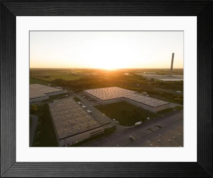 Framed Print : Aerial view of warehouse storages or industrial factory or logistics center from above Framed Print : Aerial view of warehouse storages or industrial factory or logistics center from above