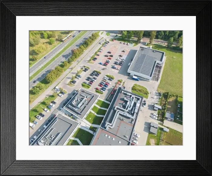Framed Print : Aerial view of residential houses neighborhood and apartment building complex at sunset Framed Print : Aerial view of residential houses neighborhood and apartment building complex at sunset