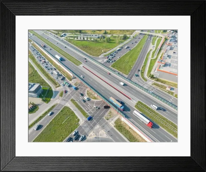 Framed Print : Aerial top view of highway junction interchange road