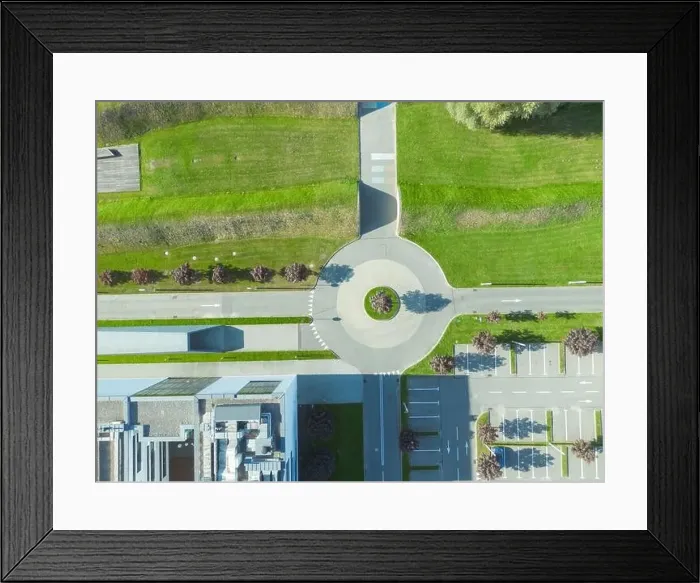Framed Print : Aerial view of green summer forest with a road Framed Print : Aerial view of green summer forest with a road