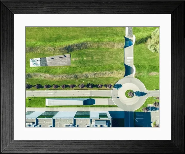 Framed Print : Aerial view of green summer forest with a road Framed Print : Aerial view of green summer forest with a road