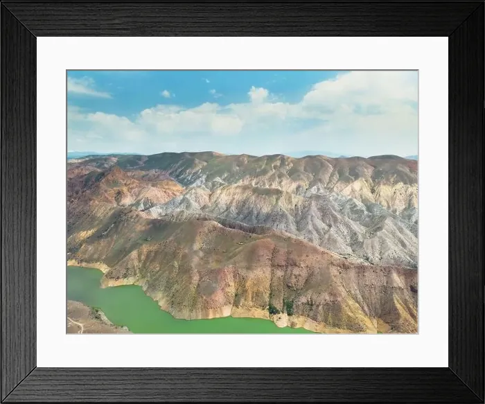 Framed Print : Aerial view on mountain lake. Drone over water reservoir at mountain valley Framed Print : Aerial view on mountain lake. Drone over water reservoir at mountain valley