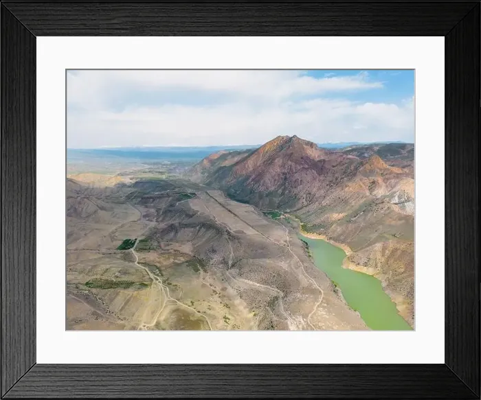 Framed Print : Aerial view on mountain lake. Drone over water reservoir at mountain valley Framed Print : Aerial view on mountain lake. Drone over water reservoir at mountain valley