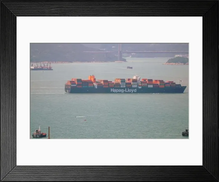 Framed Print : Hapag-Lloyd container in harbor, it is a German container transportation company with headquarters in Hamburg Framed Print : Hapag-Lloyd container in harbor, it is a German container transportation company with headquarters in Hamburg
