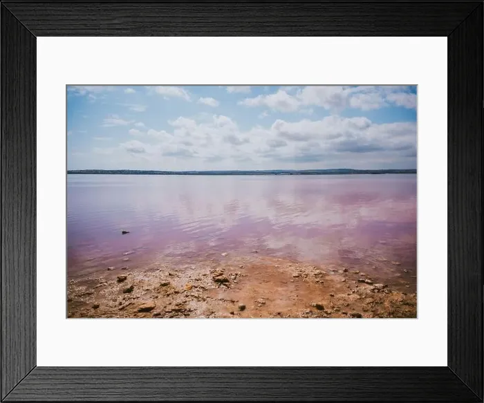 Framed Print : From above of amazing pink salt lake and of shore under cloudless blue sky in sunny summer day Framed Print : From above of amazing pink salt lake and of shore under cloudless blue sky in sunny summer day