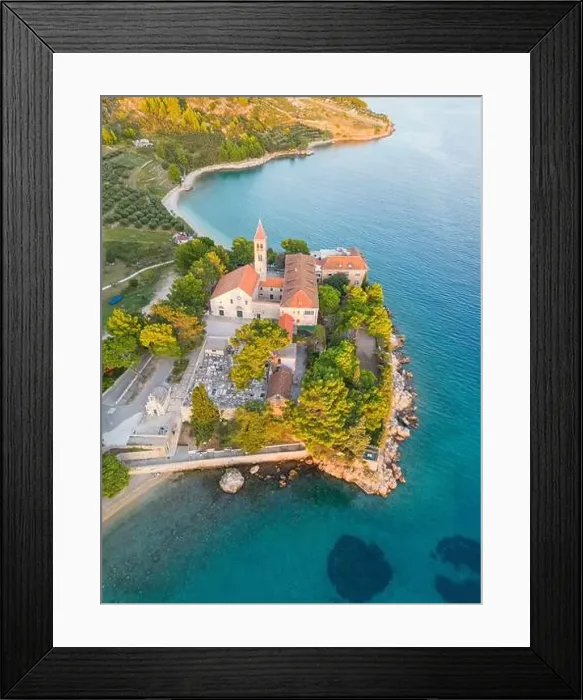 Framed Print : Aerial drone shot of the Dominican Monastery in Bol, Brač Island in Croatia Framed Print : Aerial drone shot of the Dominican Monastery in Bol, Brač Island in Croatia