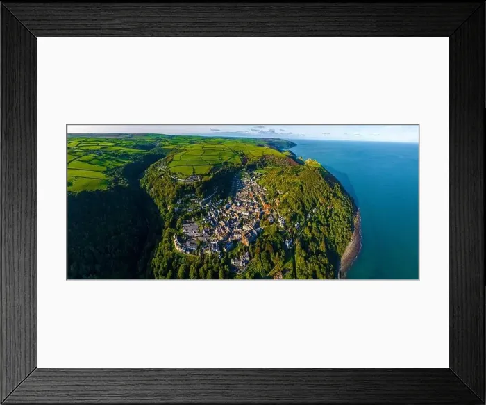 Framed Print : Aerial view of Lynton, a town on the Exmoor coast in the North Devon district in the county of Devon, England Framed Print : Aerial view of Lynton, a town on the Exmoor coast in the North Devon district in the county of Devon, England