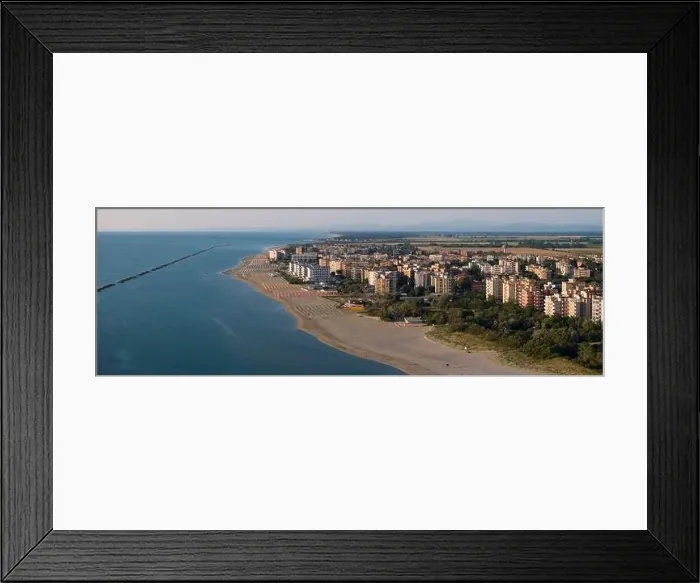 Framed Print : Drone shot of sandy beach with umbrellas and gazebos Framed Print : Drone shot of sandy beach with umbrellas and gazebos
