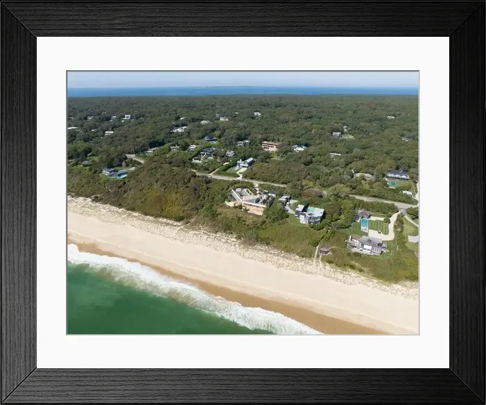 Framed Print : aerial view of homes along the coast