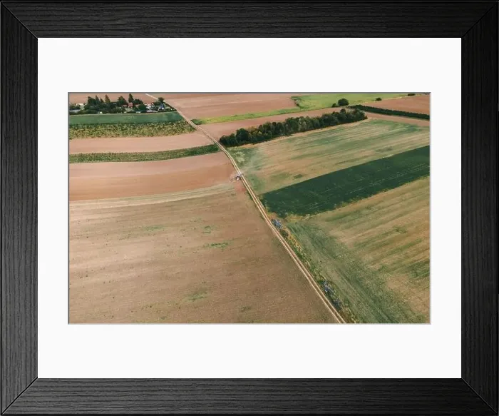 Framed Print : Drone view down on agriculture crop land with wheat fields Vineyards and Tractor Framed Print : Drone view down on agriculture crop land with wheat fields Vineyards and Tractor
