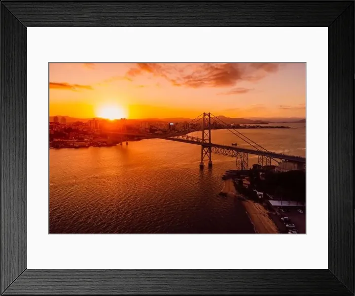 Framed Print : Old cable bridge with sunset in Florianopolis, Brazil. Aerial view Framed Print : Old cable bridge with sunset in Florianopolis, Brazil. Aerial view