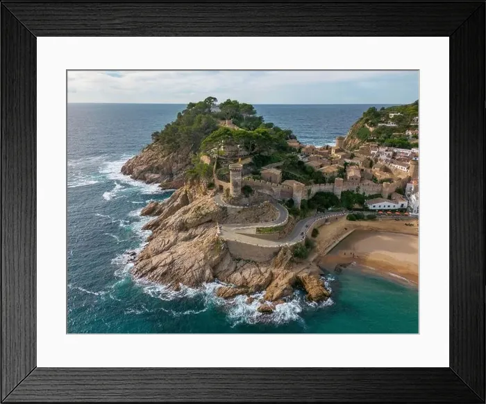 Framed Print : Aerial drone view of the coastal town named Tossa de Mar with a beach and castle Framed Print : Aerial drone view of the coastal town named Tossa de Mar with a beach and castle