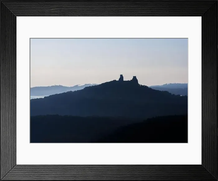Framed Print : Aerial view of ancient ruined Trosky Castle high on summits of two basalt volcanic plugs on background of autumn Framed Print : Aerial view of ancient ruined Trosky Castle high on summits of two basalt volcanic plugs on background of autumn
