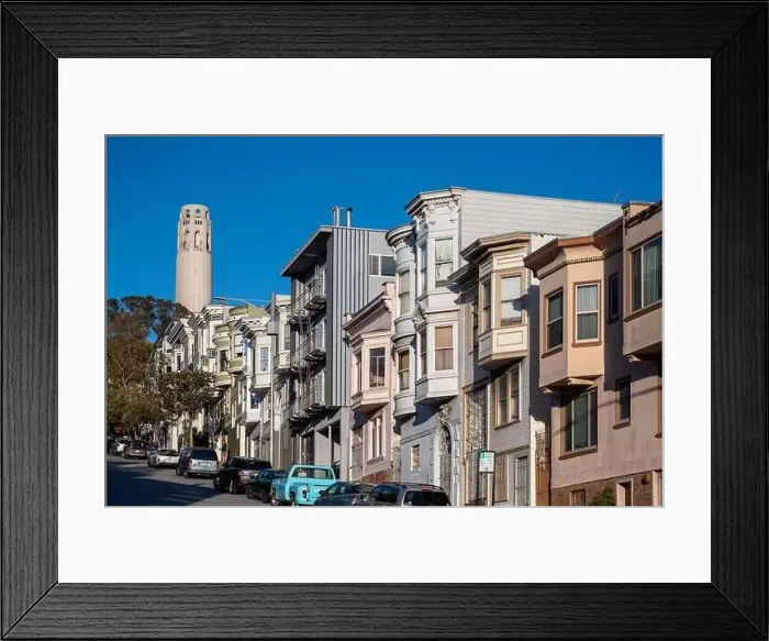 Framed Print : San Francisco, California - April 27, 2023: View Coit Tower and cityscape against blue sky during sunny day Framed Print : San Francisco, California - April 27, 2023: View Coit Tower and cityscape against blue sky during sunny day