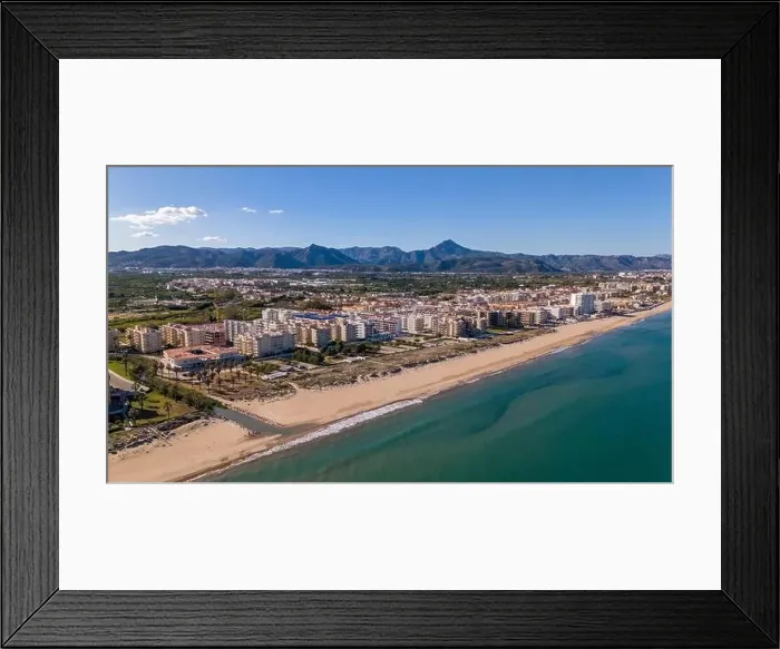 Framed Print : Aerial drone photo of the coastal town named Daimus in the Costa Blanca, Spain Framed Print : Aerial drone photo of the coastal town named Daimus in the Costa Blanca, Spain